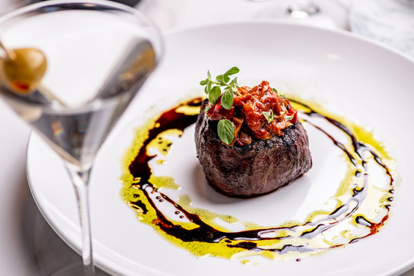 Plated multi-course dinner served at Nyam & Plot